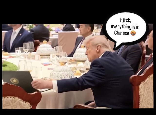 This is an edited humorous meme featuring a real photograph of former US president Donald Trump seated at a formal large banquet table, likely a state dinner held in China. He is shown reaching towards a laptop bearing the US presidential seal. A speech bubble is added next to him, reading 'F#ck, everything is in Chinese' alongside a frustrated emoji. The joke references the original post title 'Google Translate didn’t help', implying Trump is unable to understand Chinese text on menus or event materials at the dinner, and even translation tools are of no use to him in this scenario.