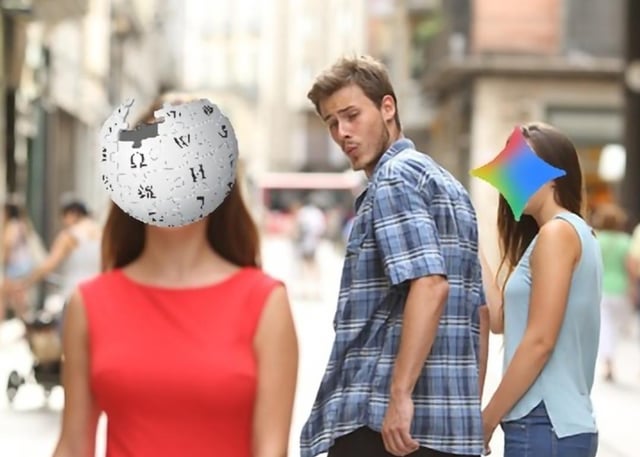 This is an edited iteration of the viral Distracted Boyfriend meme format. The original format depicts a man walking with his girlfriend, turning to stare lustfully at a passing woman in a red dress. In this version, the face of the woman in red is replaced with the Wikipedia logo, while the girlfriend's face is replaced with the Google search diamond logo. The joke satirizes the common online habit of prioritizing Wikipedia as a trusted source for quick factual information, even when Google search is the more easily accessible default option, playing on the widespread perception that Wikipedia delivers more consistent, reliable results than standard Google searches that often include ads, low-quality content, or irrelevant results.