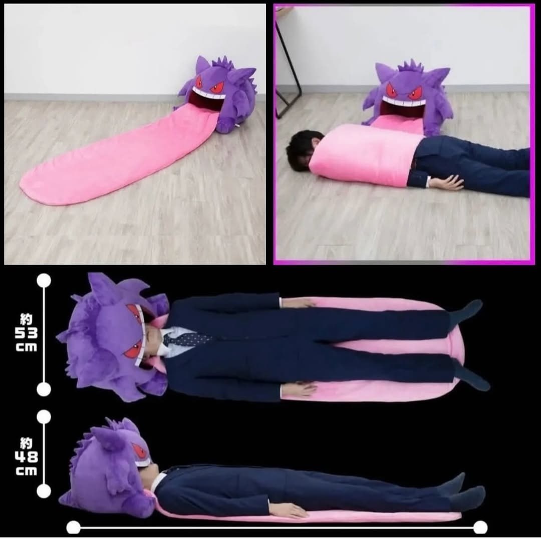 A two-panel meme featuring a Gengar plush toy with an exaggeratedly long pink tongue. Left panel shows the purple Gengar plush alone on a wooden floor, displaying its menacing expression with red eyes and open mouth, with its extremely long pink tongue stretched out. Right panel shows a person in a blue suit lying face-down on the floor with their head inside Gengar's mouth and body wrapped in the long pink tongue, creating a humorous visual illusion of being eaten. The bottom section includes Japanese measurement text (約53 cm and 約48 cm) indicating the size of the plush toy.