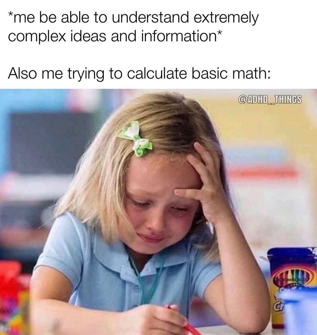 This is a relatable humor meme split into two parts: text at the top and a reaction image below. The first line of text claims the creator can easily understand extremely complex ideas and information, followed by a second line setting up the contrast: their experience when attempting basic math calculations. The image below shows a young blonde elementary school girl with a green bow in her hair, sitting at a classroom desk, holding a red pen, pressing one hand to her forehead, looking tearful and visibly stressed while trying to complete schoolwork. The meme humorously highlights the common neurodivergent, especially ADHD, experience of having inconsistent, uneven cognitive skills, where difficult abstract concepts are easy to grasp, but simple routine tasks like basic arithmetic feel overwhelming.