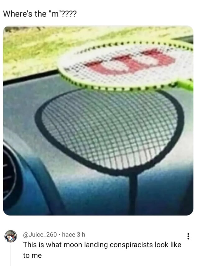 The meme features a photo of a Wilson brand tennis racket resting on the surface of a car. The racket's strings display the brand's signature red 'W' logo, while the shadow of the racket cast on the car clearly shows the same 'W' shape. Text at the top of the image asks the deliberately absurd question 'Where's the "m"????', which ignores obvious visual evidence to invent a nonexistent problem. A Twitter comment below the photo compares the person asking this absurd question to moon landing and flat earth conspiracy theorists, mocking their habit of fixating on invented, meaningless discrepancies to dismiss widely proven, obvious facts.