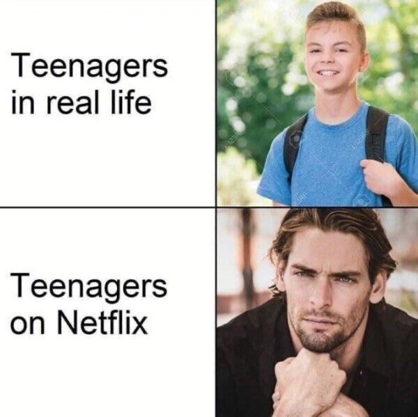 This is a two-panel comparison meme that jokes about the discrepancy between real teenagers and how teenagers are portrayed in Netflix content. The top panel is labeled 'Teenagers in real life' and features a photo of a typical, awkward-looking young teen boy wearing a blue t-shirt and carrying a backpack, smiling nervously at the camera. The bottom panel is labeled 'Teenagers on Netflix' and features a photo of a fully grown, conventionally attractive adult man with styled hair and stubble, holding his chin and giving a smoldering, serious look at the camera, highlighting the common entertainment industry trope of casting much older actors to play teenage roles.