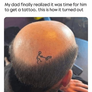 This meme centers on a humorous, self-deprecating tattoo choice. The image shows the back of a bald man's (the creator's dad) head, where a small tattoo of a person pushing a lawnmower is inked directly on his scalp. The caption above the photo reads: *My dad finally realized it was time for him to get a tattoo.. this is how it turned out*. The joke lies in the clever visual pun: the lawnmower references 'mowing' the man's bald head, treating his hairless scalp like a lawn. It's a lighthearted, wholesome take on embracing baldness with a silly, creative tattoo that leans into the man's lack of hair rather than hiding it.