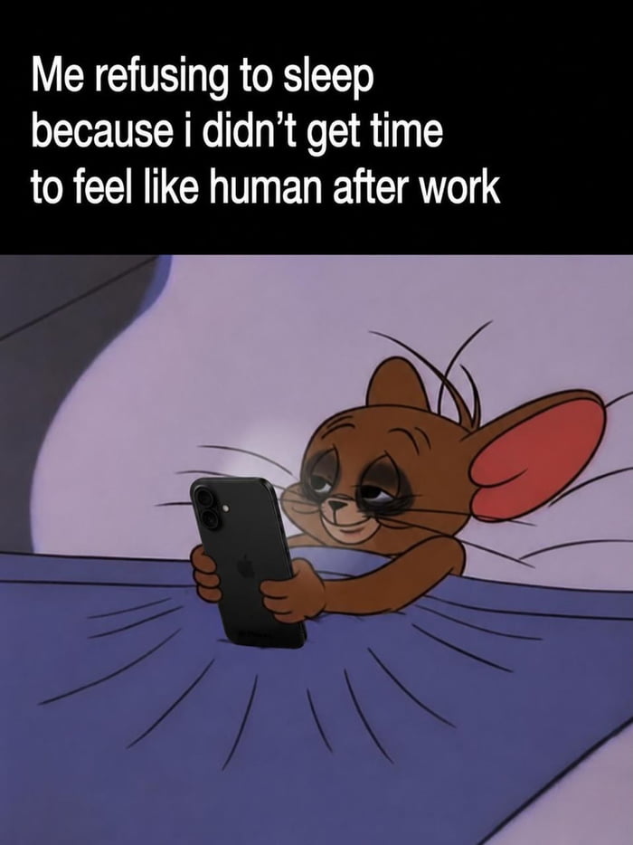 This meme features a top text block placed over an edited cartoon image. The text reads 'Me refusing to sleep because i didn’t get time to feel like human after work'. The image below depicts Jerry, the mouse character from the *Tom and Jerry* animated series, lying in bed under a blue blanket while holding an iPhone in both hands. He is edited to have exaggerated heavy dark under-eye circles, appearing visibly tired and sleep-deprived, yet still chooses to scroll on his phone instead of going to sleep. The meme humorously captures the widespread relatable experience of 'revenge bedtime procrastination', where people intentionally delay sleeping to carve out personal leisure time after a full workday, sacrificing rest to feel like they have control over their own free time.