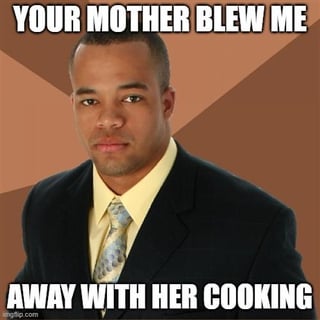 A meme featuring a real man in a black suit, yellow shirt, and patterned tie standing against a brown diagonal-striped background. The top text reads 'YOUR MOTHER BLEW ME AWAY' and the bottom text continues 'WITH HER COOKING,' creating a pun where the initial phrase 'blew me away' (which could imply a vulgar double entendre) is humorously resolved to mean being impressed by someone's cooking skills. The character has a neutral expression and is standing still, with the focus on the text punchline.