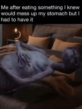 Distressed alien in bed meme template